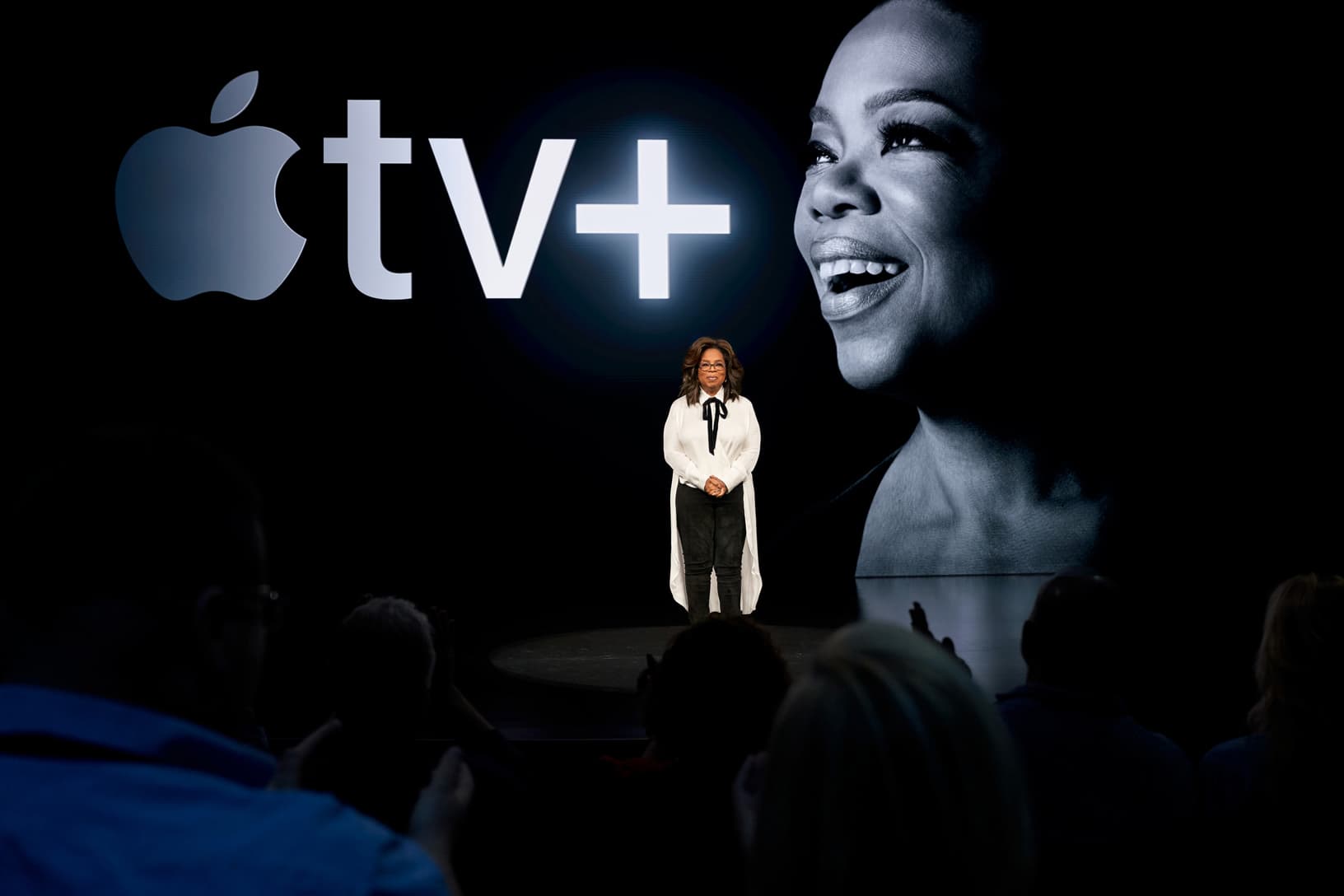 Apple bashkon forcat me Oprah